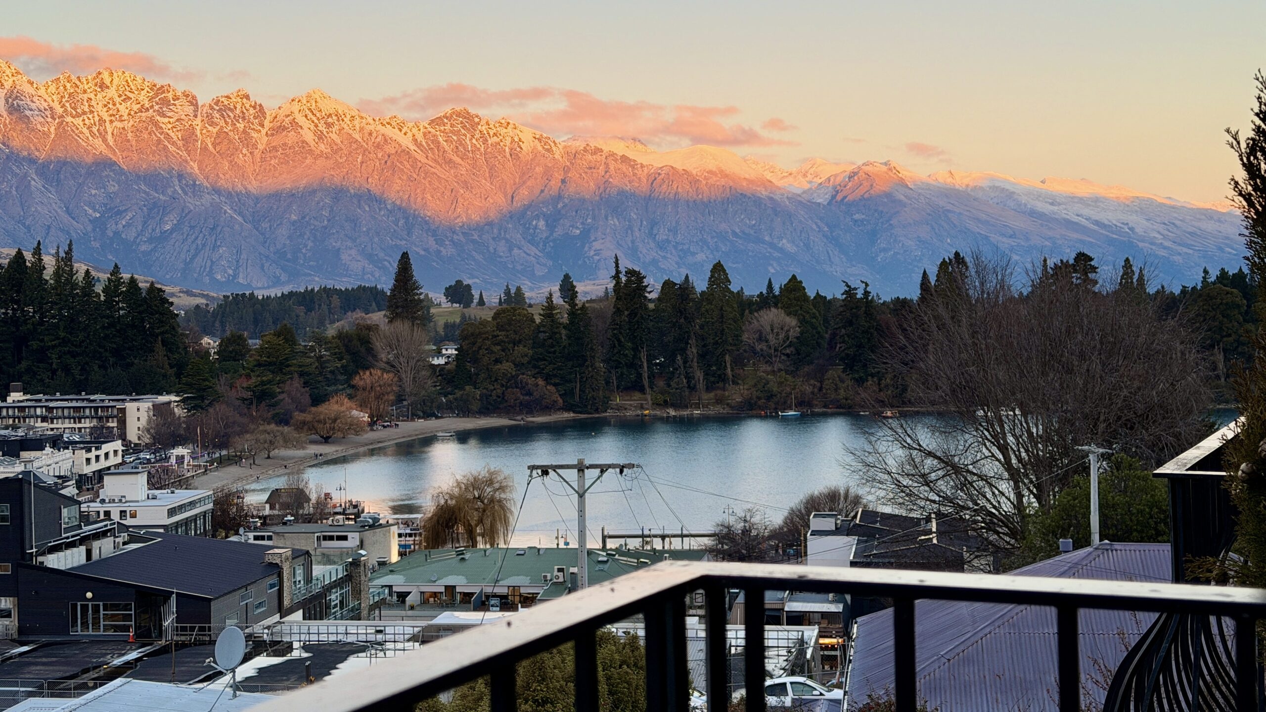 Lake and mountain view over Queenstown rooftops at Browns Boutique Hotel, Queenstown, New Zealand