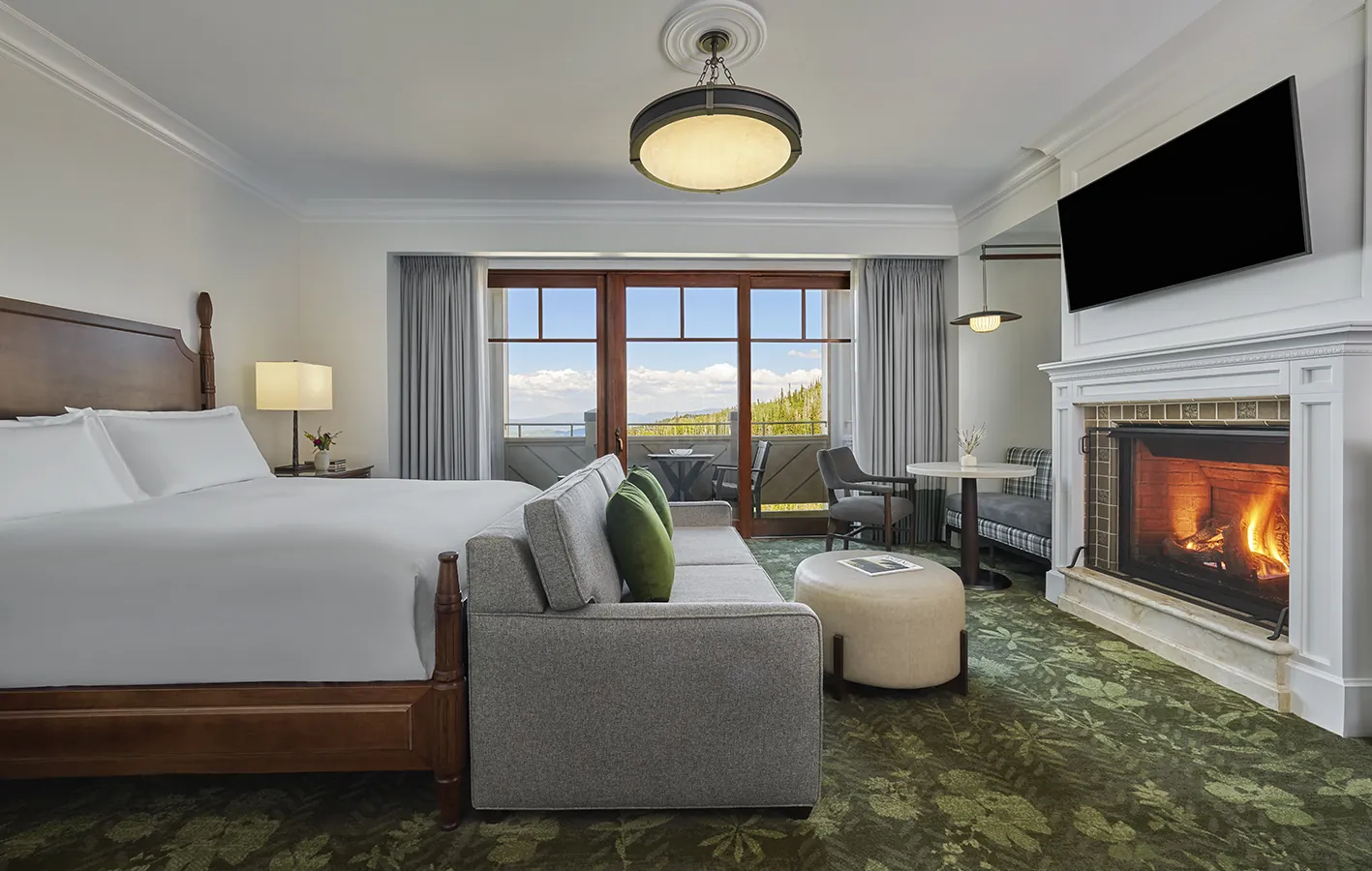 Guest room with bed, sitting area and fireplace at Montage Deer Valley, Utah, USA