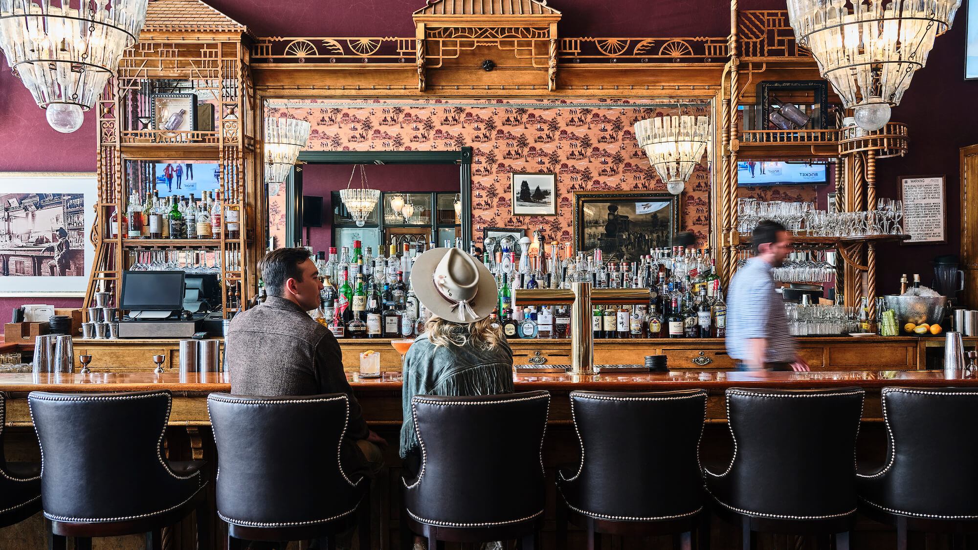 Guests at the historic J-Bar at Hotel Jerome, Aspen, USA