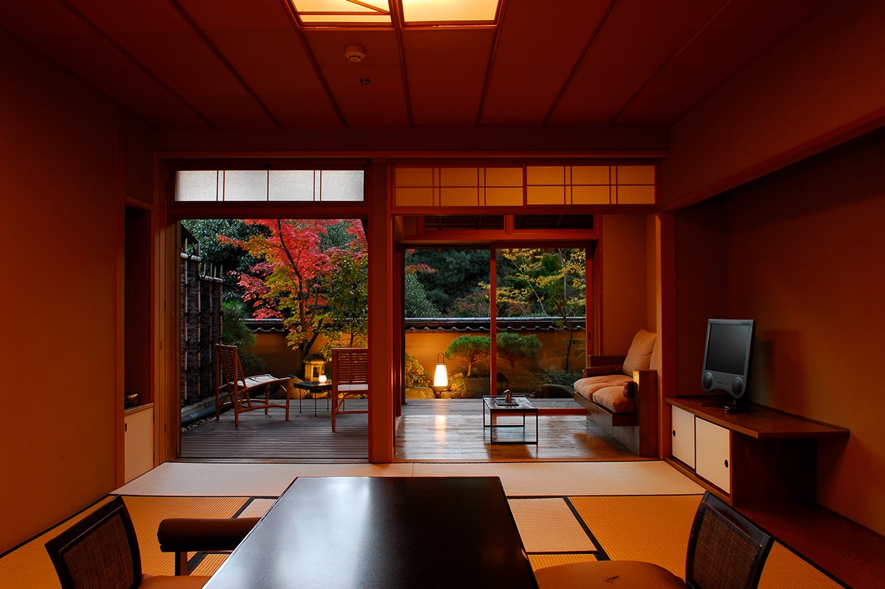 Japanese-style sitting room opening onto a garden at Gora Kadan, Hakone, Japan