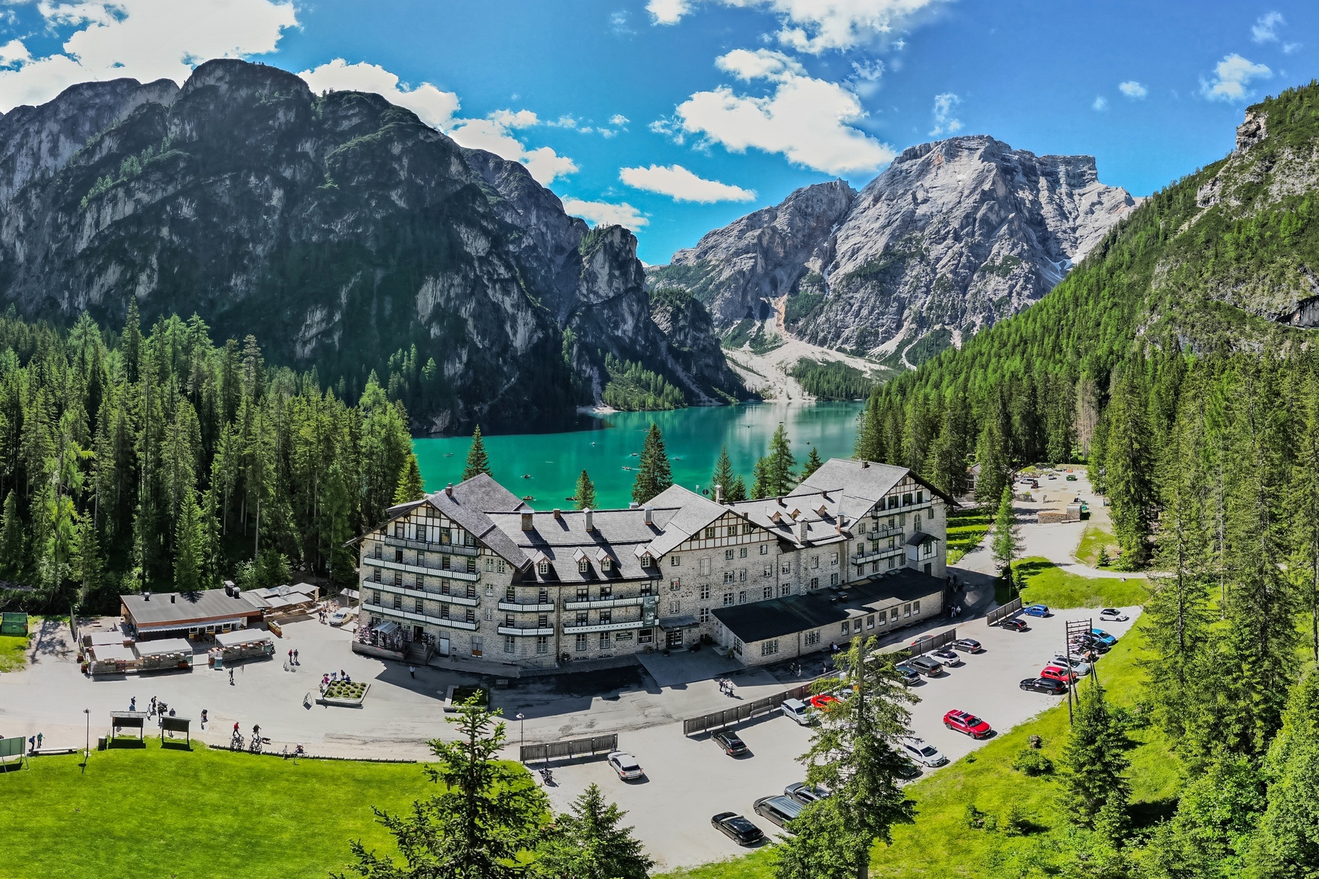 Hotel exterior at the foot of the mountains beside Lake Braies, Lago di Braies (Pragser Wildsee), Italy