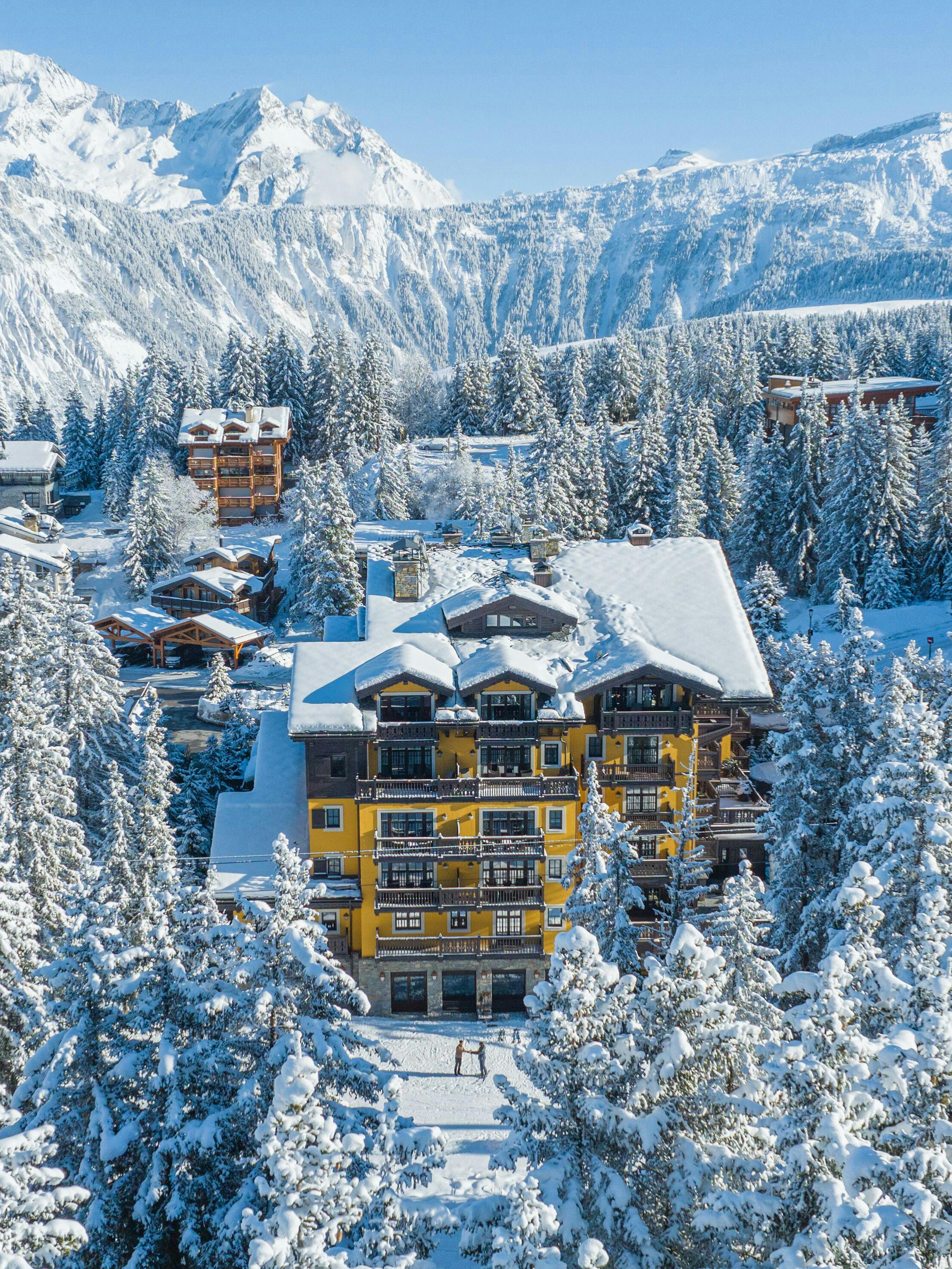 Aerial mountain view of Cheval Blanc Courchevel and its alpine setting