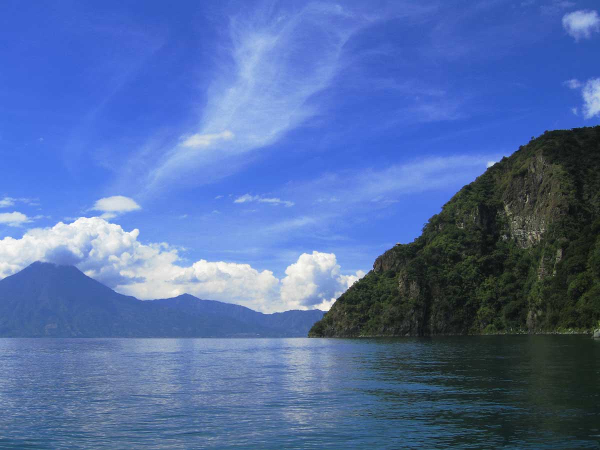 Lake view along the forested nature reserve shoreline, Laguna Lodge, Lake Atitlán, Guatemala