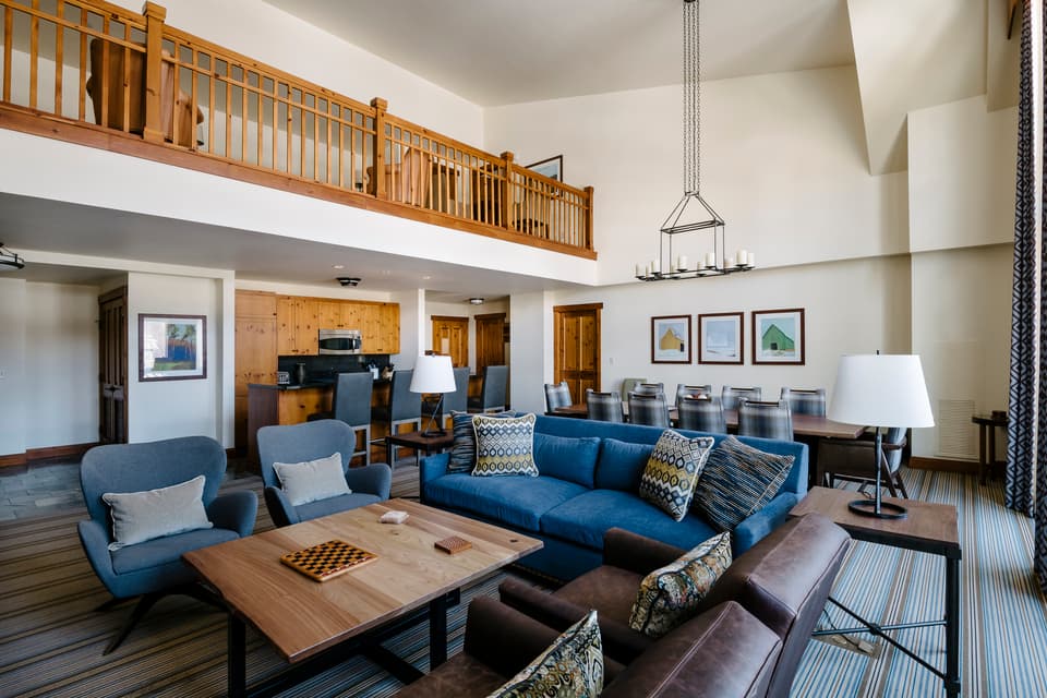 Penthouse lounge with fireplace, The Lodge at Spruce Peak, Stowe, USA