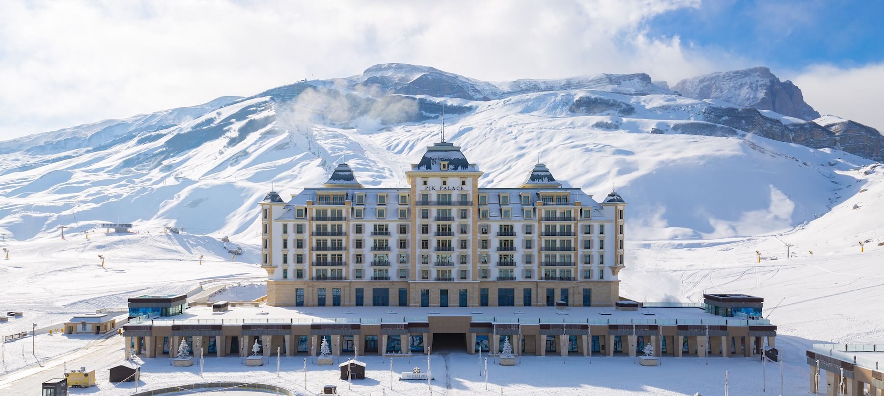 Snow-covered Pik Palace Shahdag beneath the Caucasus peaks