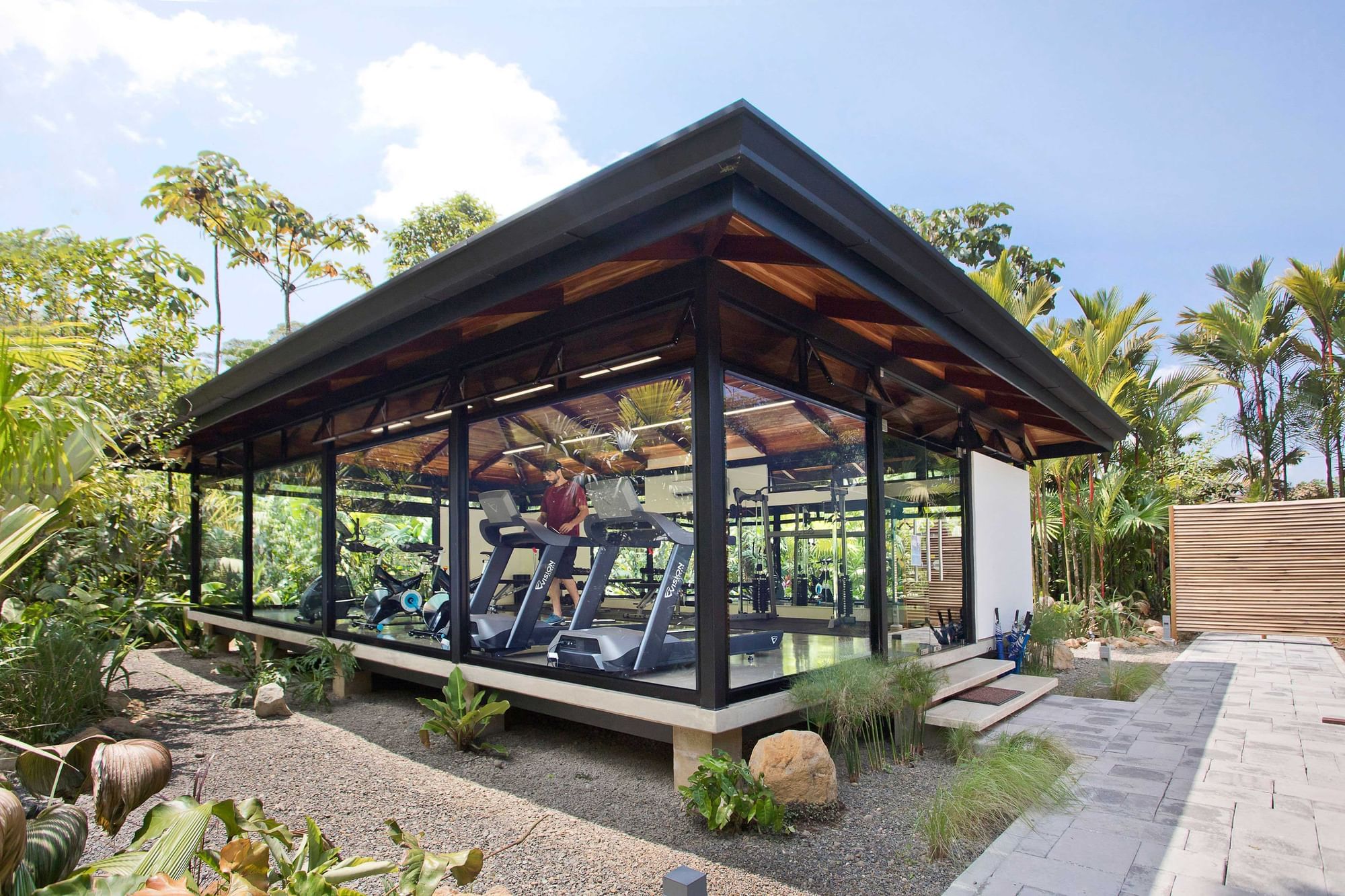 Glass-walled fitness pavilion in landscaped tropical gardens, Hideaway Rio Celeste, Tenorio, Costa Rica