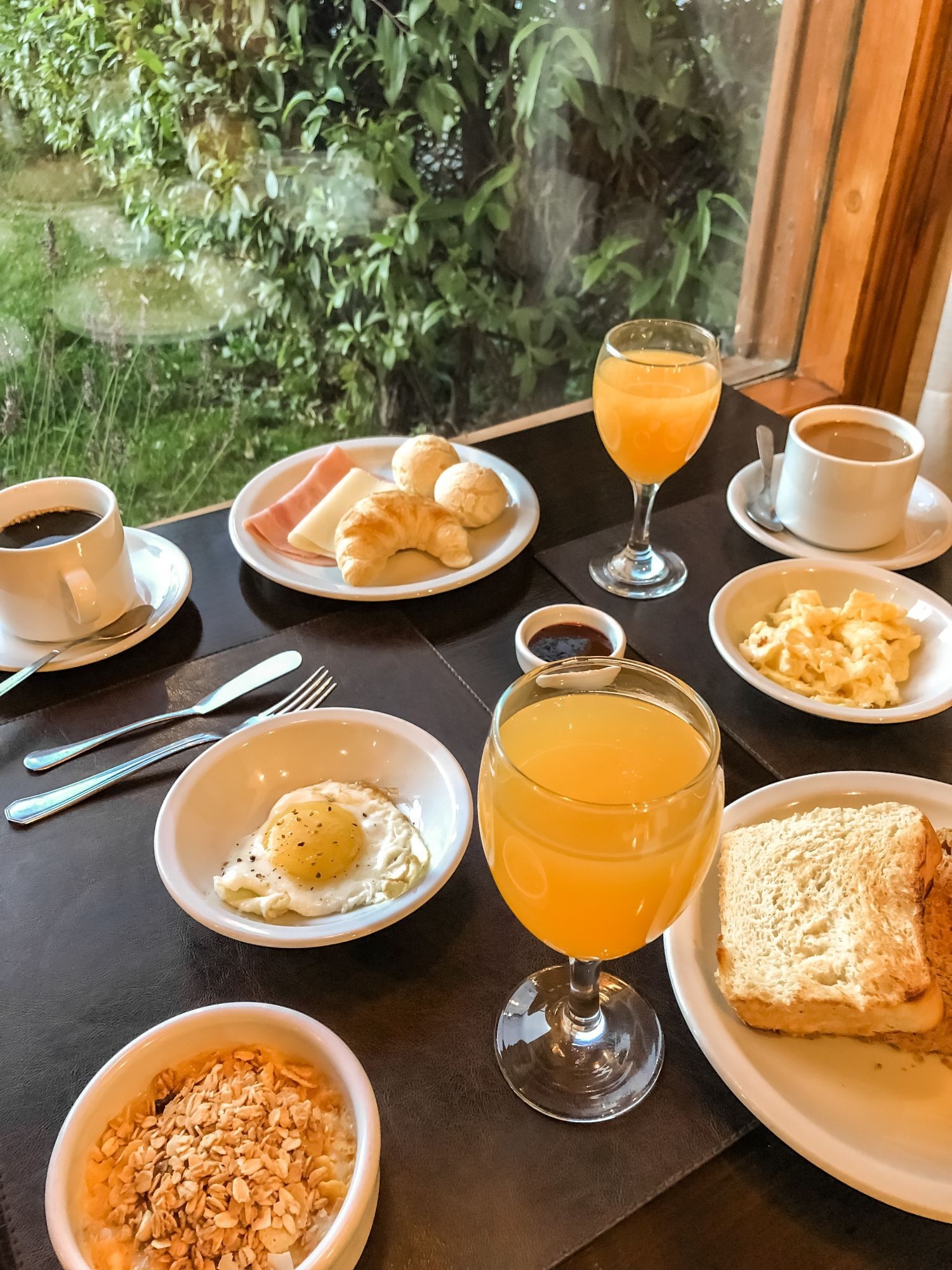Breakfast table beside a window at Hostería Senderos, El Chaltén, Argentina