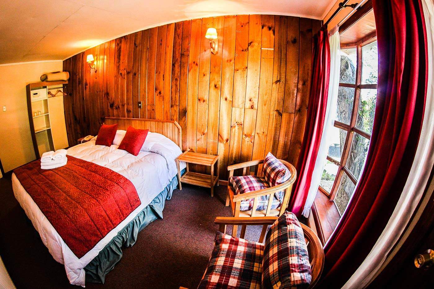 A standard guest room at Hostería Pehoé.