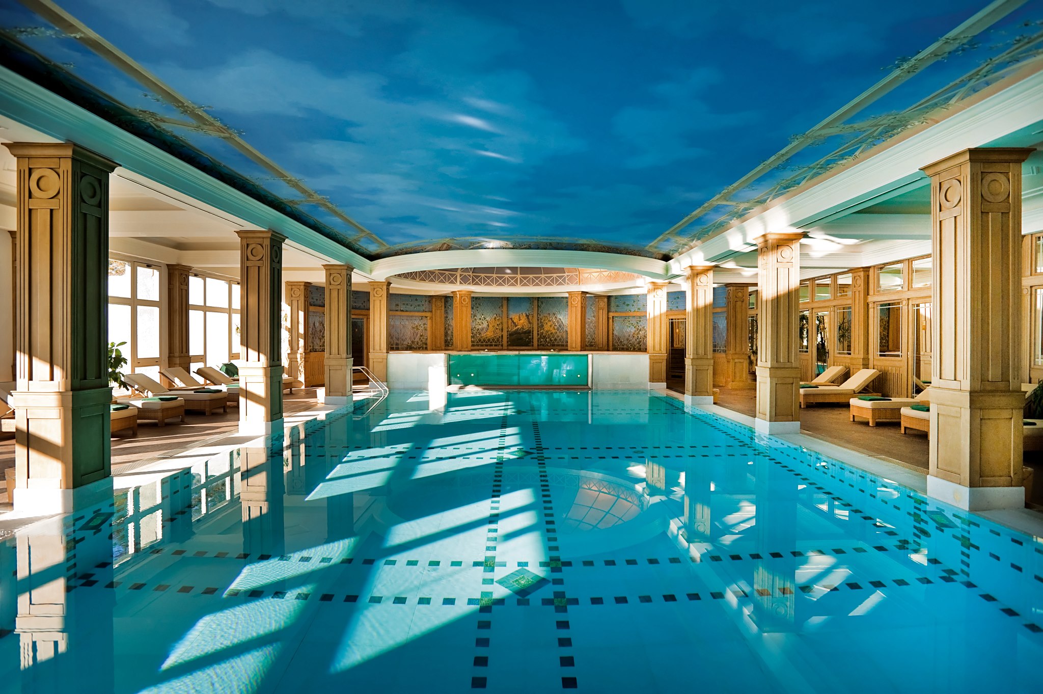 Historic Cristallo indoor swimming pool with columns and a painted blue ceiling, Cortina d'Ampezzo