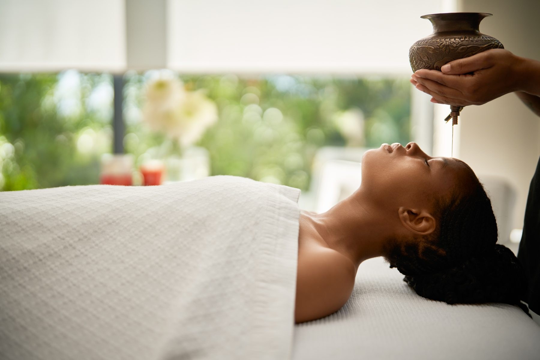 Guest receiving a spa treatment at Delaire Graff Estate.