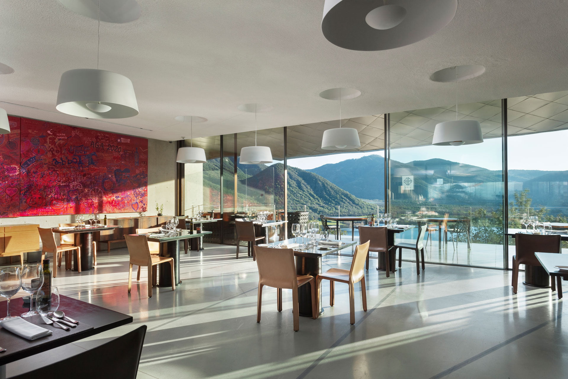 Milla Milla dining room with windows onto the mountains at VIK Chile, Millahue Valley, Chile