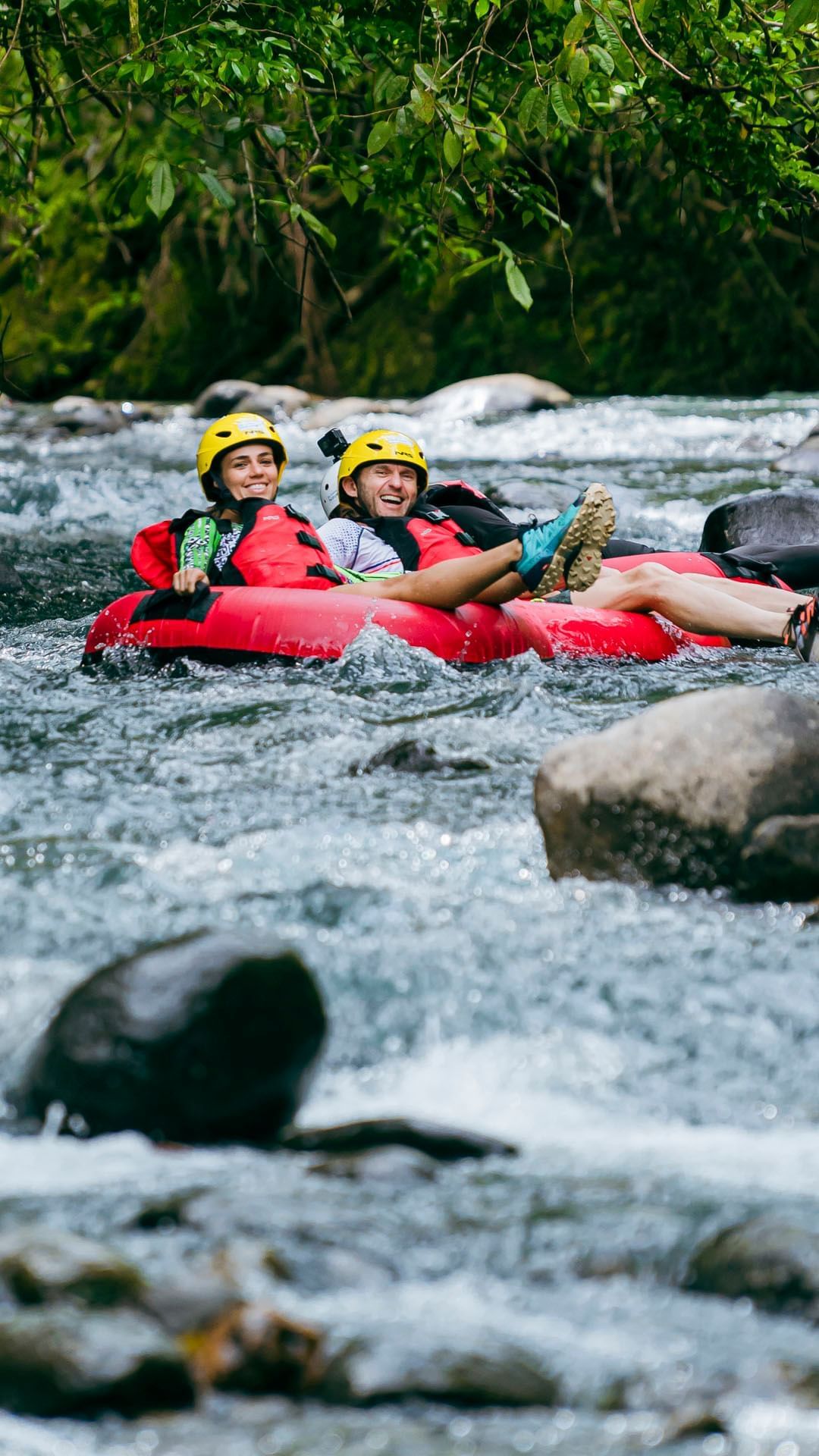 Whitewater rafting through rocky river rapids, Hideaway Rio Celeste, Tenorio, Costa Rica