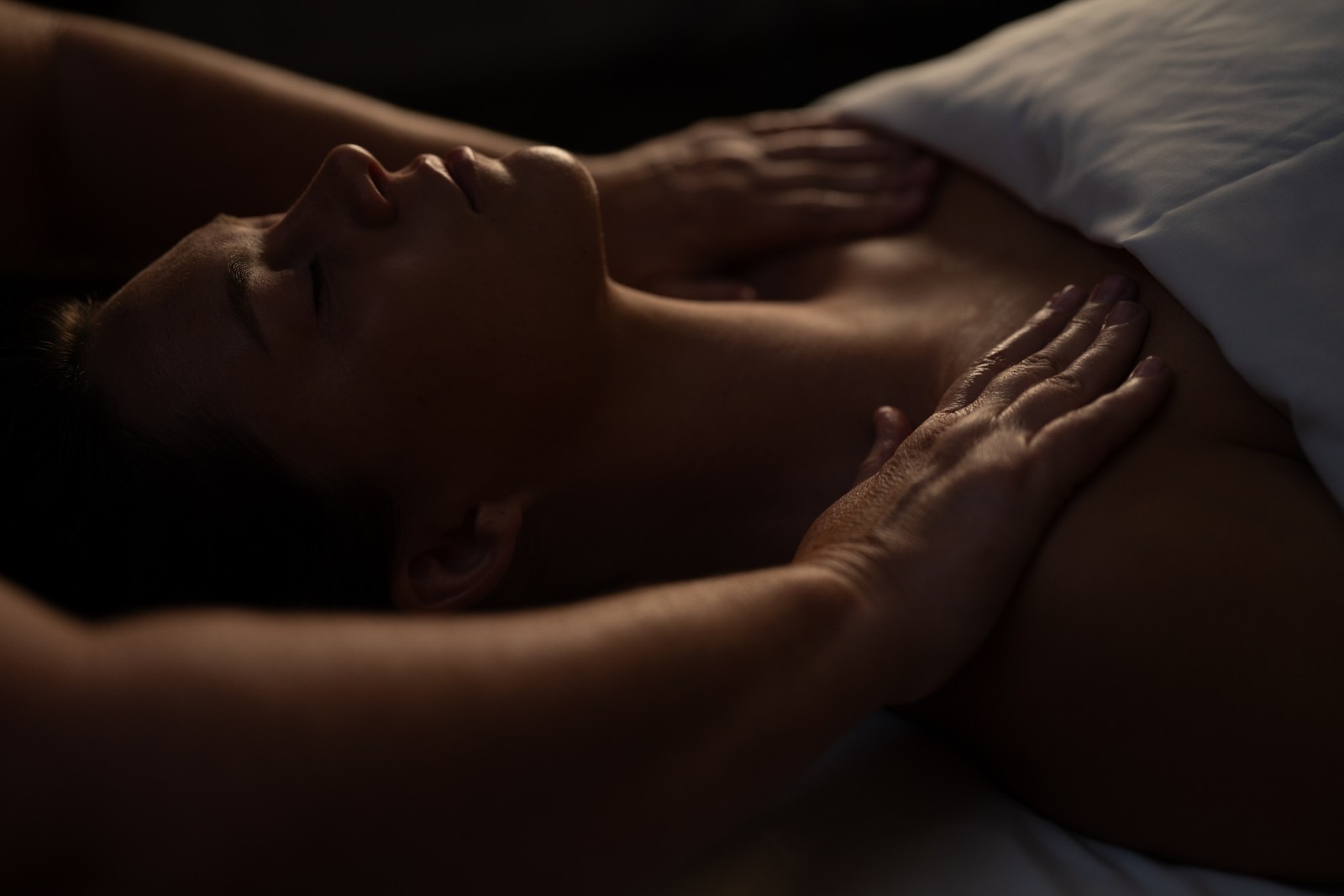 Guest receiving a massage at Vida Spa, Fairmont Chateau Whistler, British Columbia, Canada