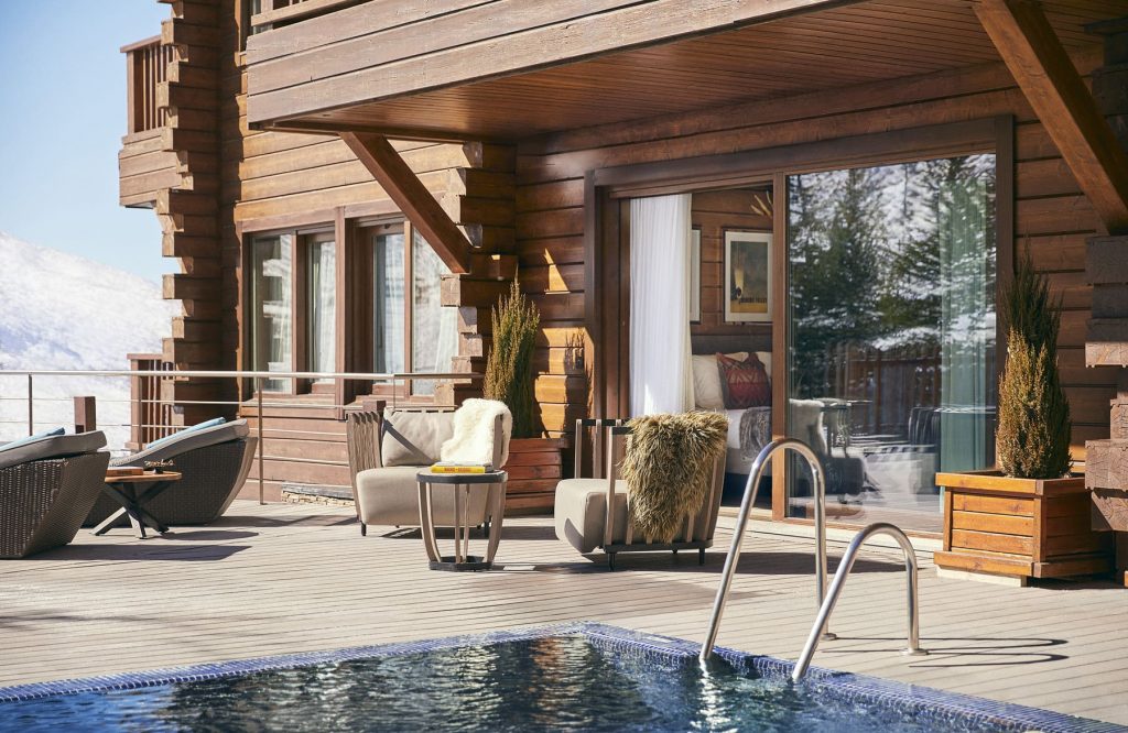 Poolside terrace outside El Lodge guest rooms, Sierra Nevada, Spain