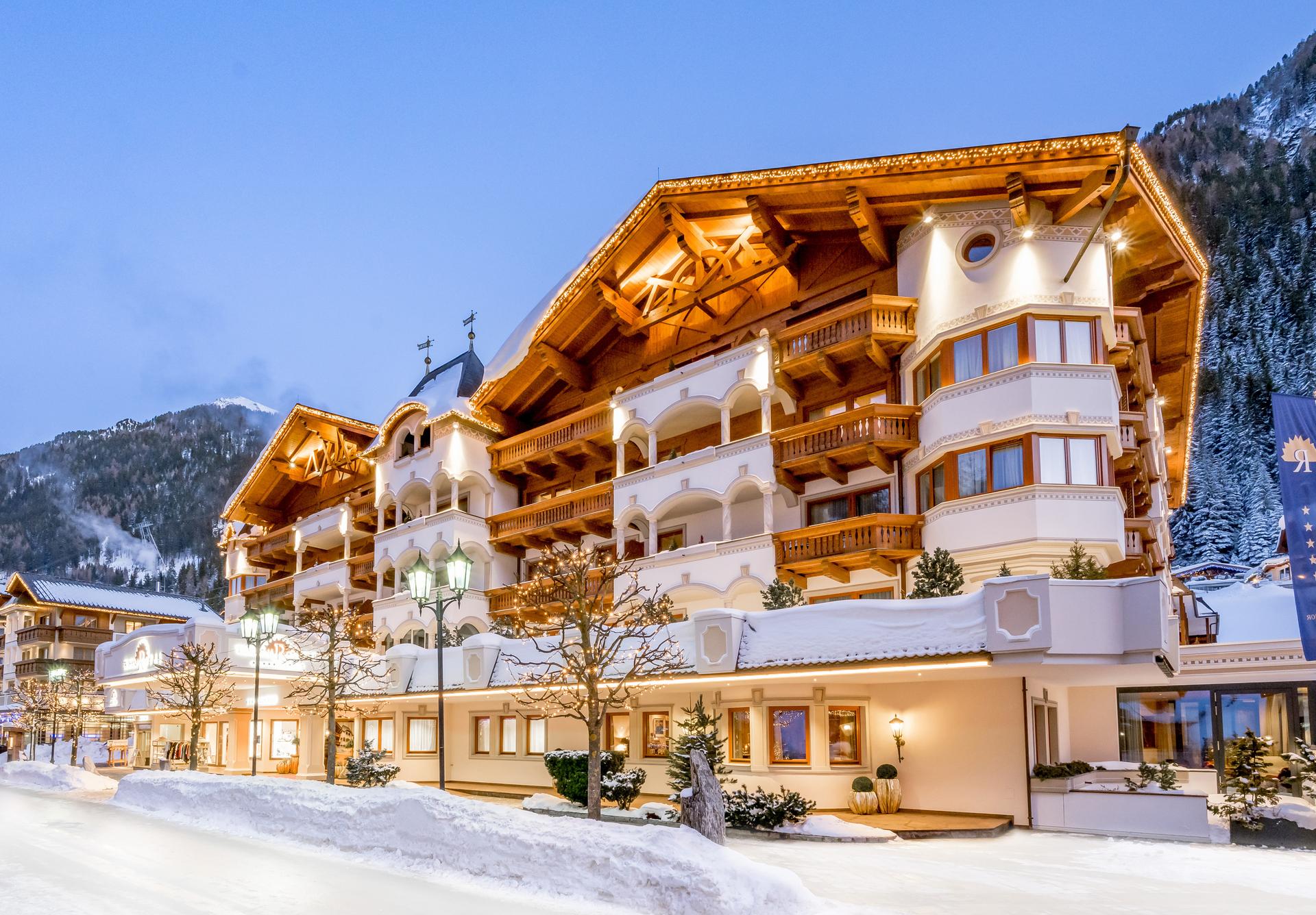 Snowy hotel exterior at dusk, Trofana Royal, Ischgl, Austria