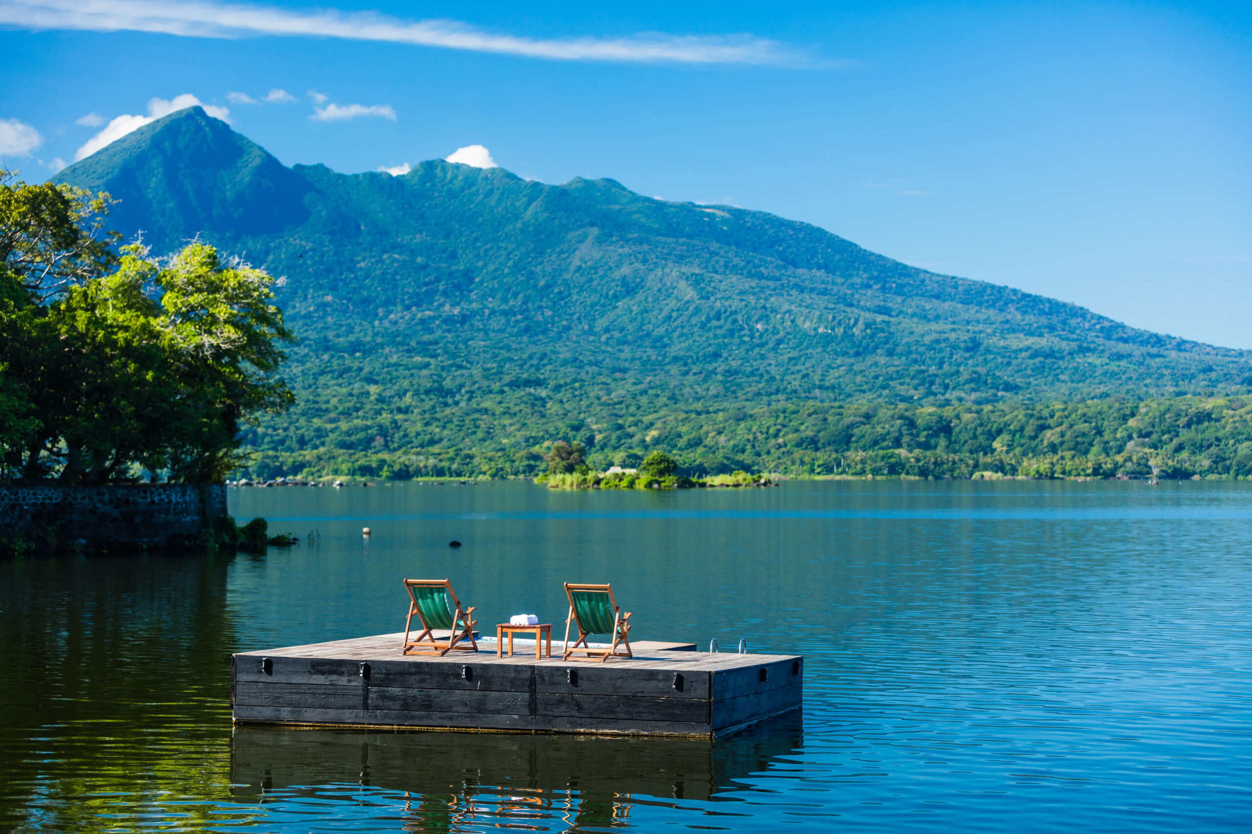 Floating deck on the lake with a view of Mombacho volcano, Jicaro Island Ecolodge, Lake Nicaragua, Granada, Nicaragua
