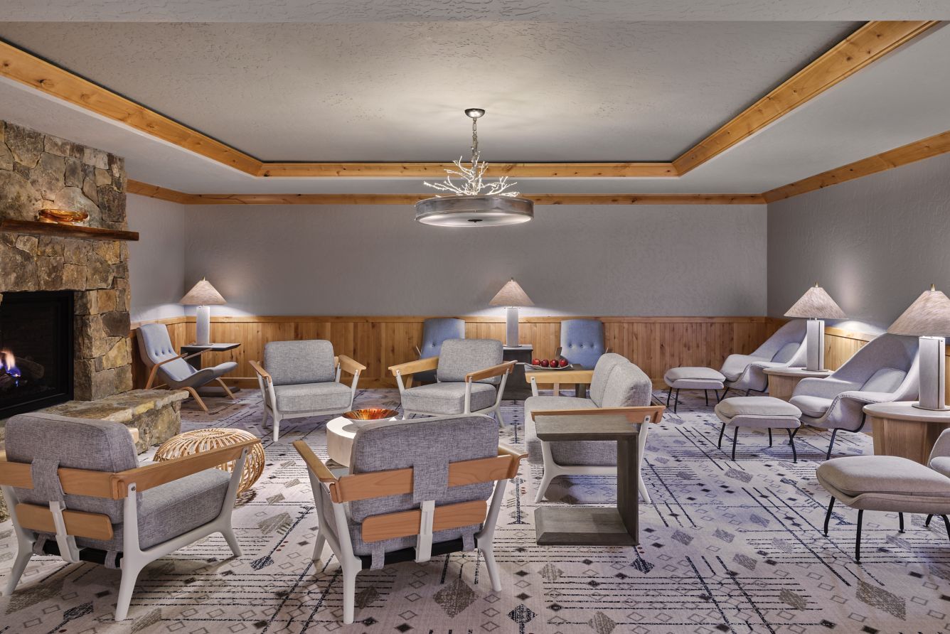 Comfortable armchairs and soft lighting in the spa relaxation lounge at The Ritz-Carlton, Bachelor Gulch.
