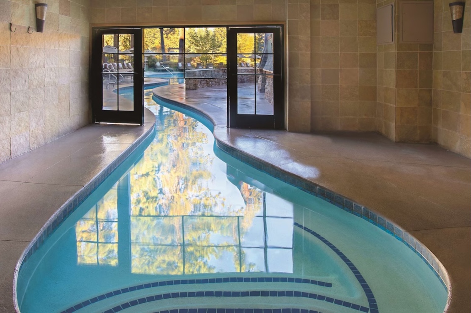 Indoor swim-out pool entrance leading to the resort's outdoor pool area at Hyatt Regency Lake Tahoe Resort, Spa and Casino