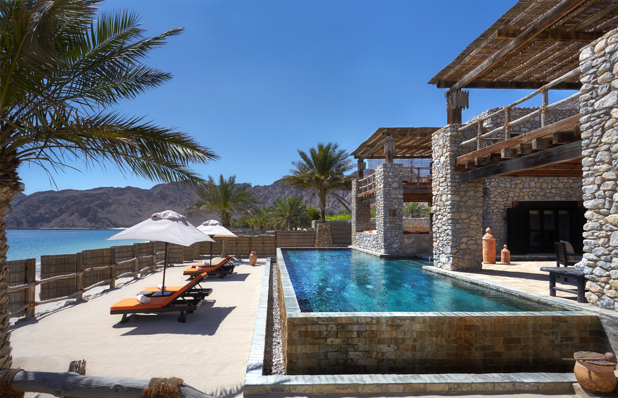 Private swimming pool beside the stone-built Retreat villa at Six Senses Zighy Bay.