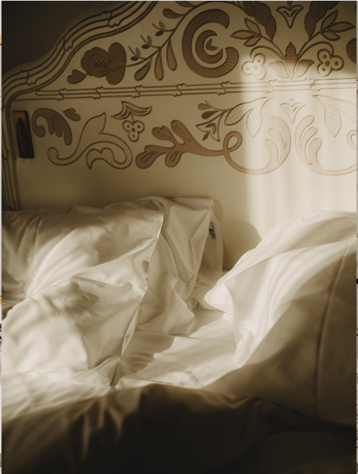 Guest room with bed at Badrutt's Palace, St. Moritz, Switzerland