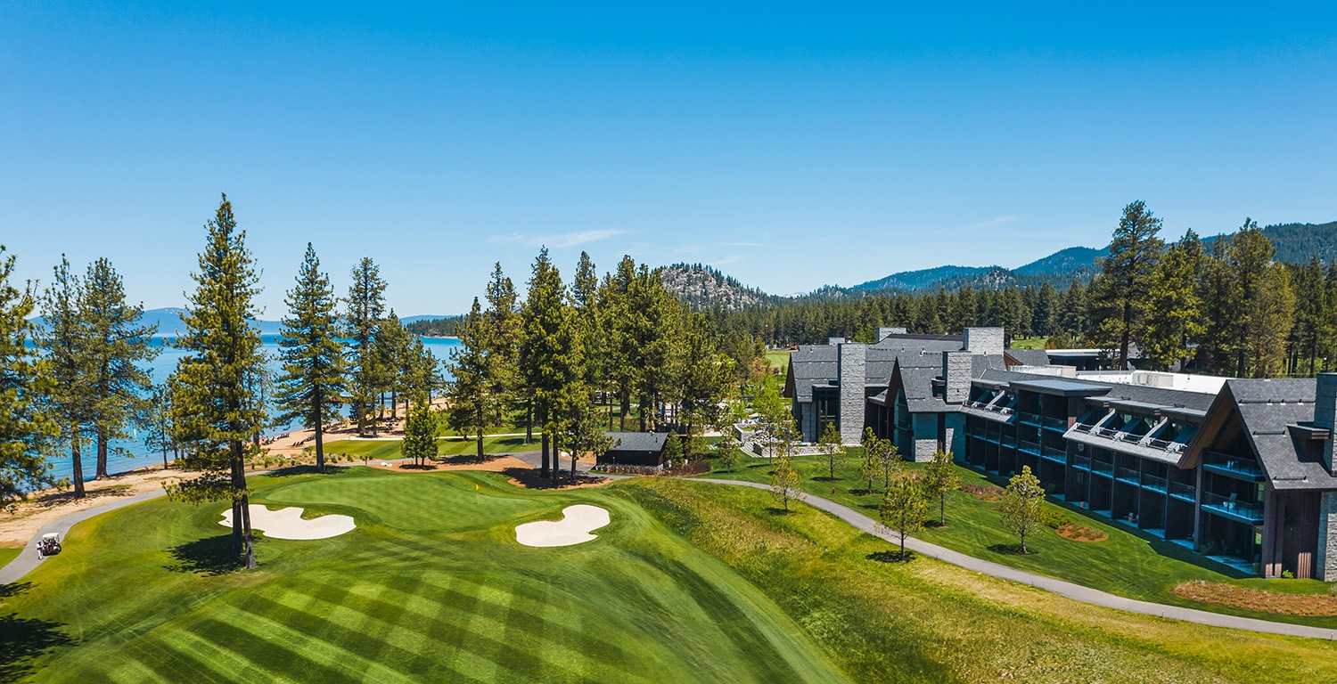 Aerial view of the lodge, lawns, pine trees, and Lake Tahoe, Stateline, USA