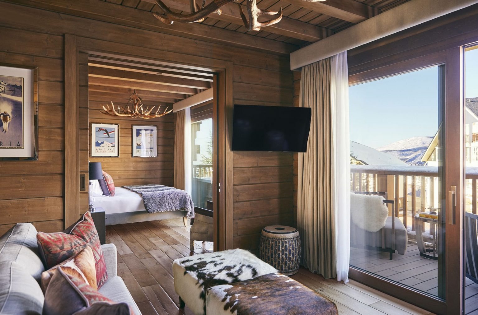 Lodge Suite bedroom and sitting area at El Lodge, Sierra Nevada, Spain