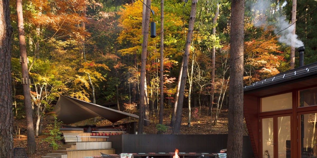 Woodland terrace amid autumn foliage at Hoshinoya Fuji, Lake Kawaguchi, Japan