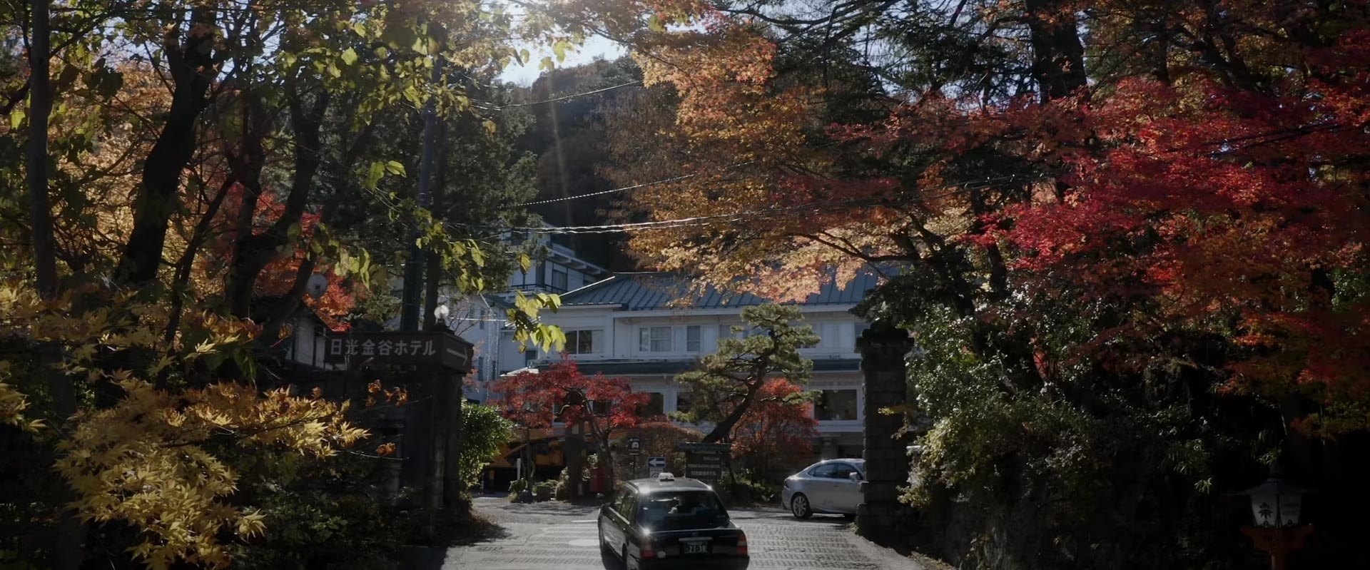 Red bridge framed by autumn foliage in Nikko
