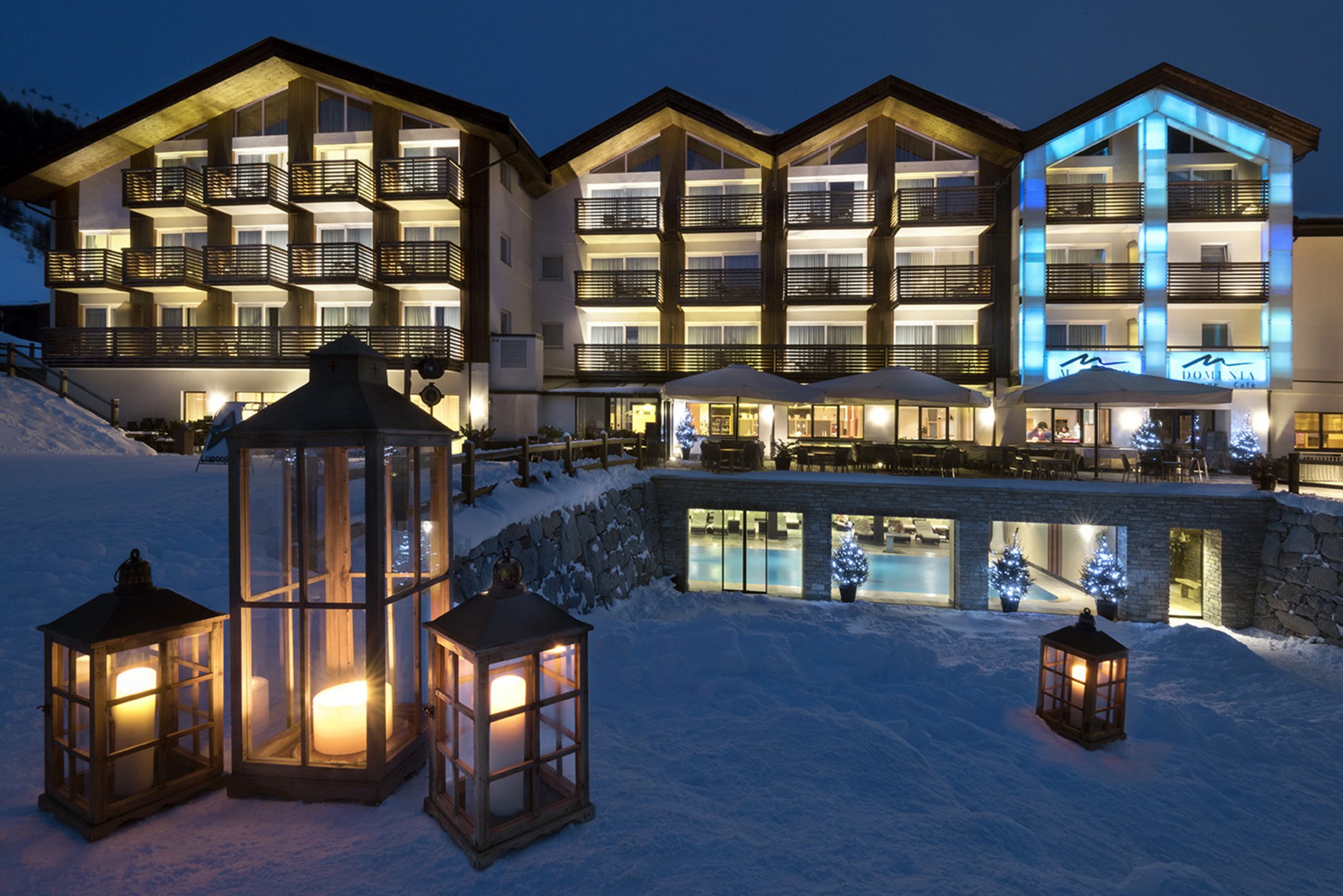 Illuminated winter hotel exterior, Lac Salin Spa & Mountain Resort, Livigno, Italy