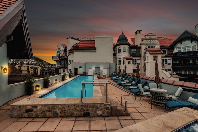 The Arrabelle rooftop swimming pool at dusk