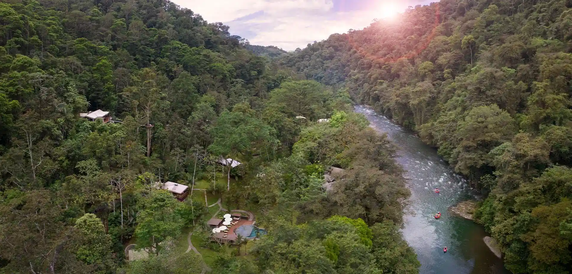 Aerial view of the lodge and river winding through rainforest, Pacuare Lodge, Pacuare River, Costa Rica