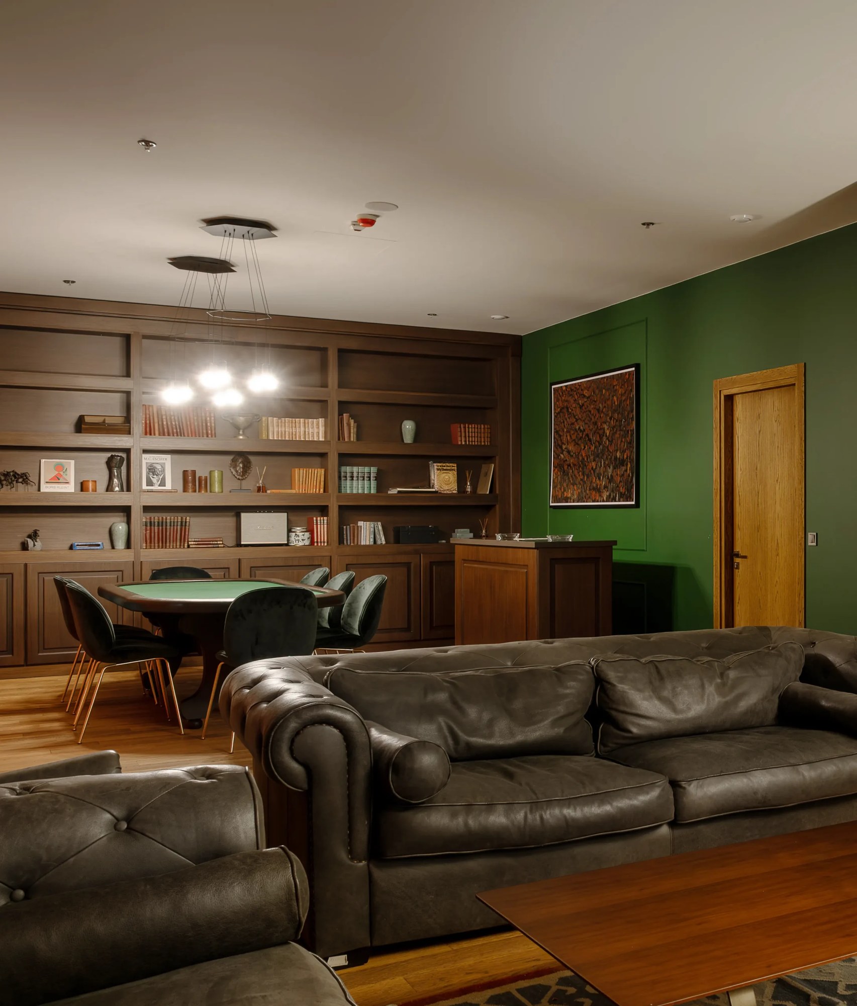 Leather seating and billiards in the private lounge at Gudauri Lodge