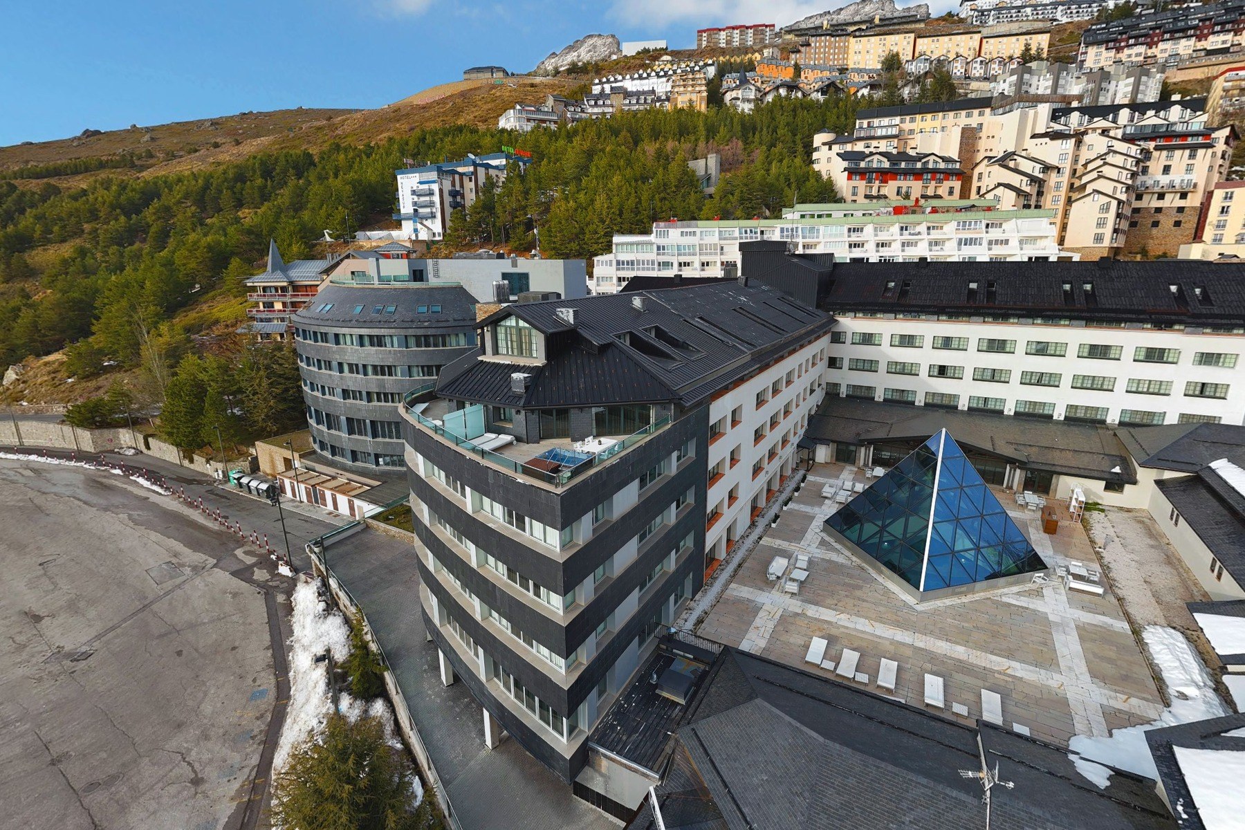 Meliá Sol y Nieve roofs and surrounding Sierra Nevada ski village