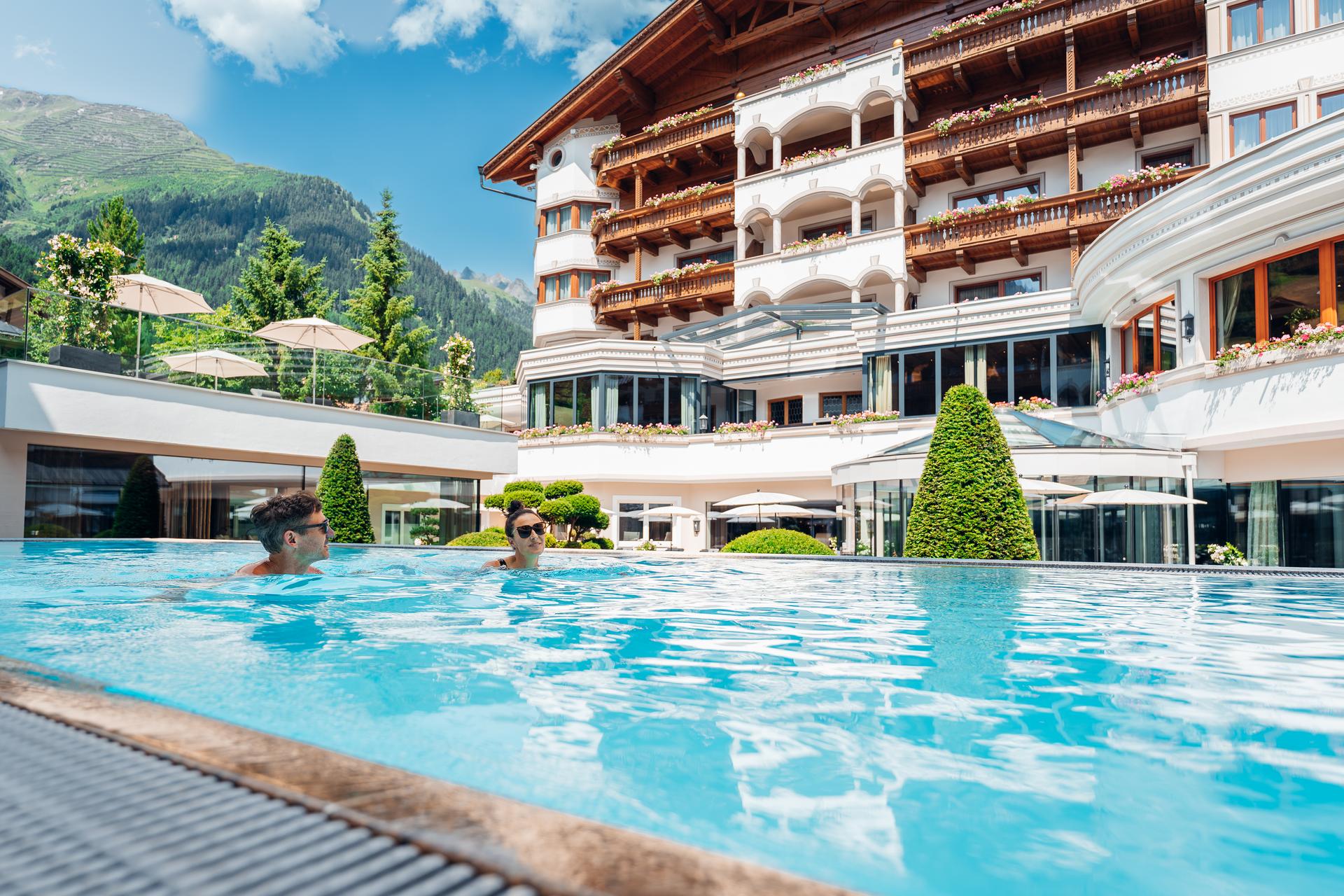 Outdoor pool beside the hotel, Trofana Royal, Ischgl, Austria