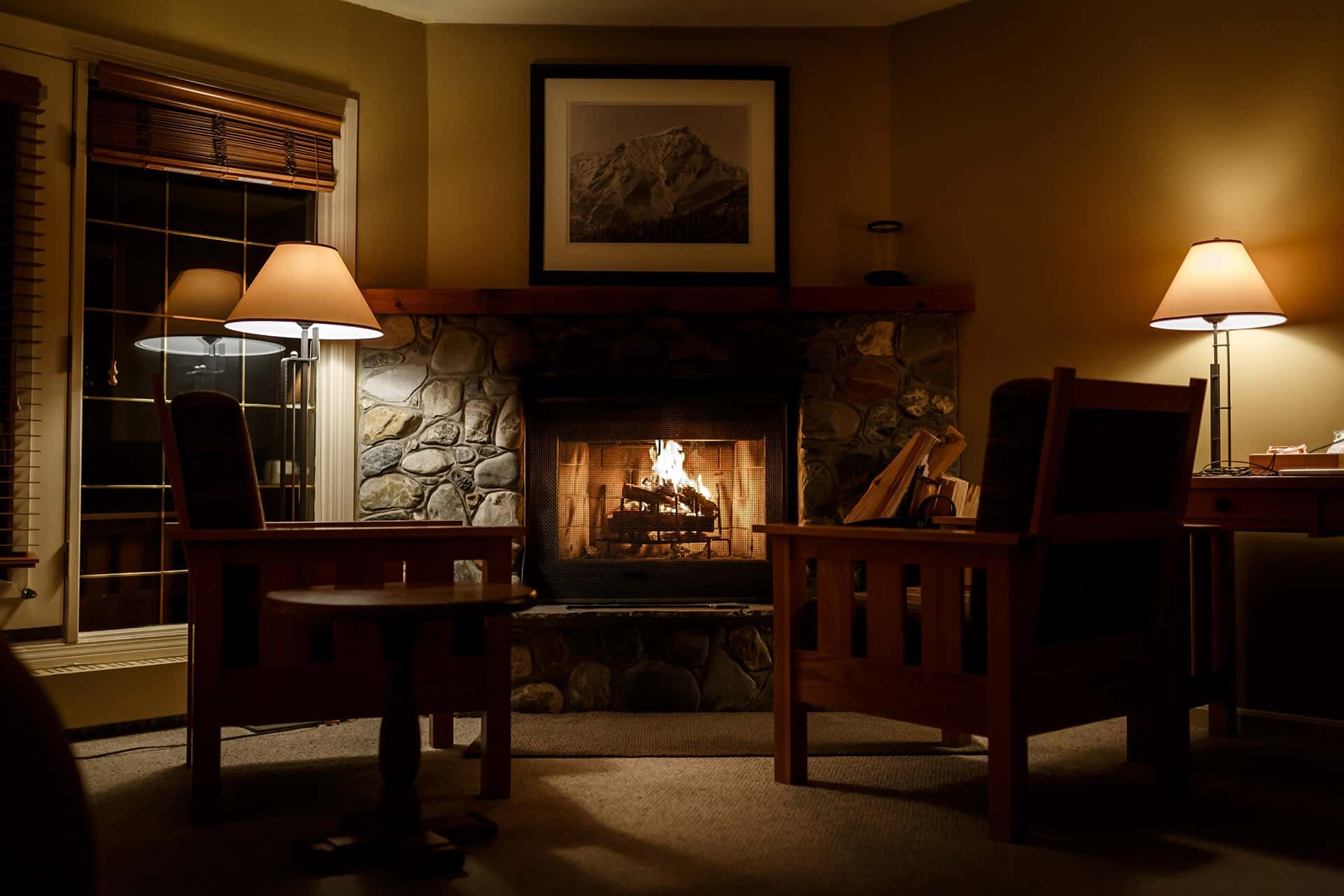Fireplace and seating inside the lodge at Emerald Lake Lodge, Yoho National Park, Canada