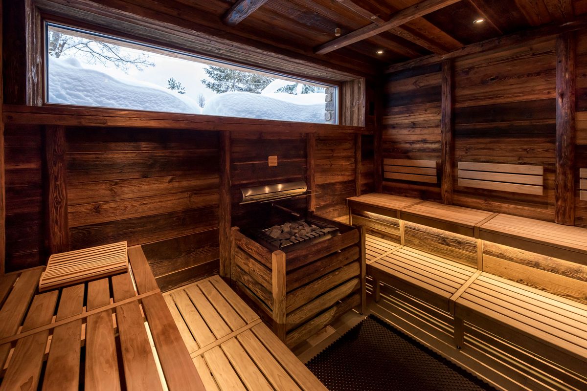 Outdoor timber sauna interior, Hotel Tannenhof, St. Anton am Arlberg, Austria