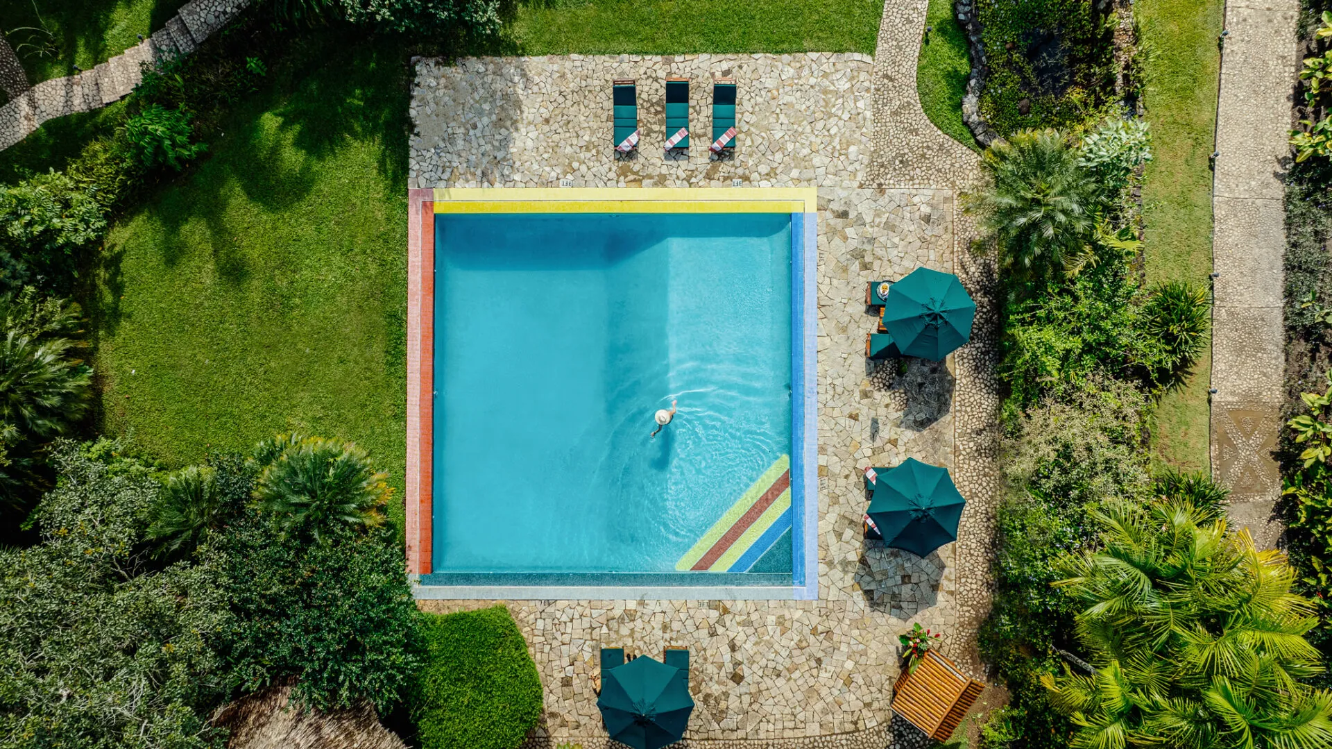 Overhead view of the turquoise swimming pool, Blancaneaux Lodge, Mountain Pine Ridge, Cayo, Belize