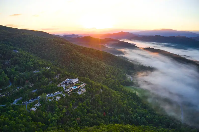 Elevated aerial view of Blackberry Mountain amid forested terrain, Walland, USA
