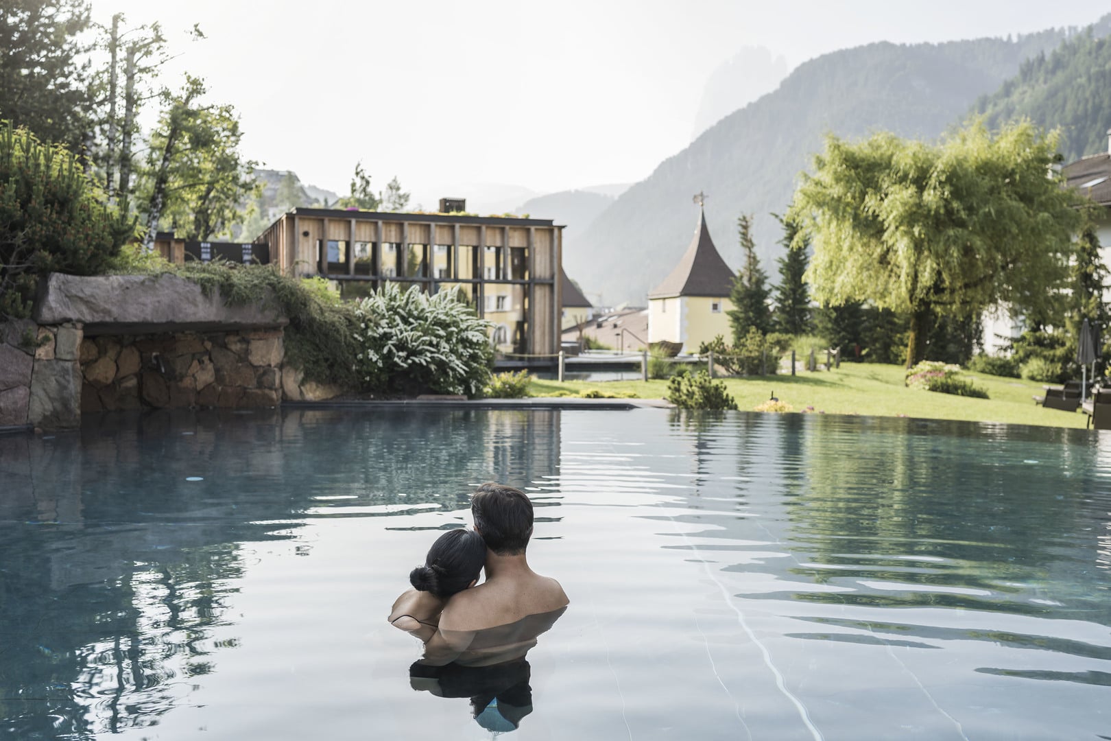 Natural outdoor bathing pool, ADLER Spa Resort Dolomiti, Ortisei, Italy