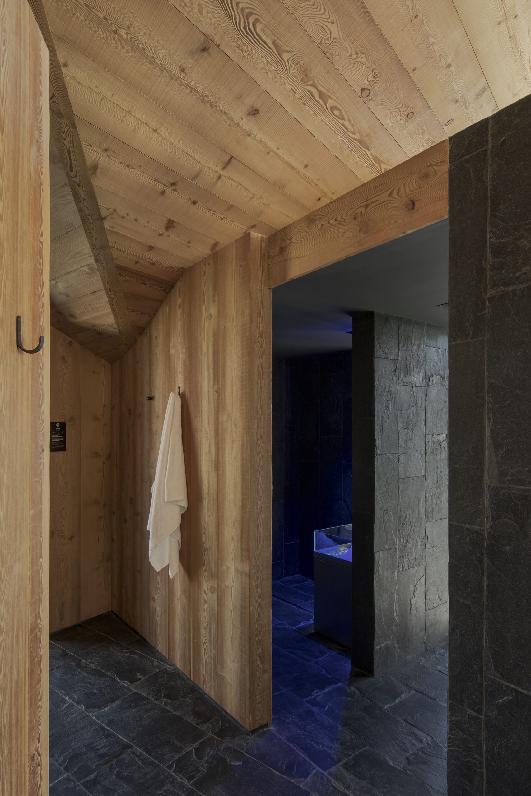 Stone-lined spa passage and treatment area, Hotel de Lën, Cortina d’Ampezzo, Italy