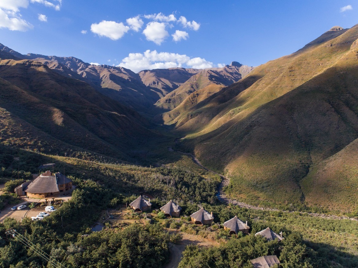 Lodge exterior nestled in a dramatic mountain valley, Maliba Mountain Lodge, Ts’ehlanyane National Park, Lesotho