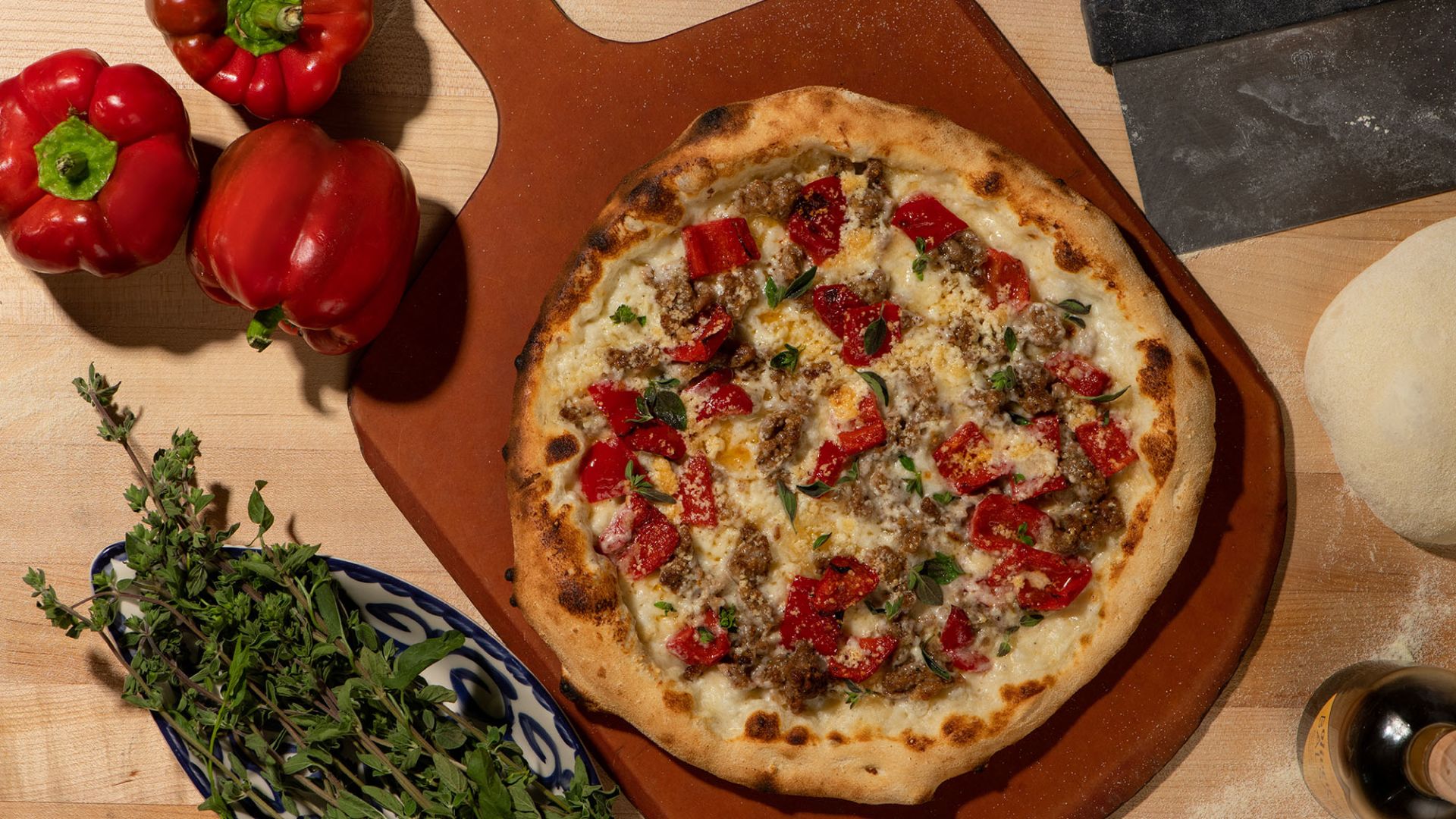 Pizza topped with tomatoes and cheese at Ristorante Del Lago at The Broadmoor, Colorado Springs, USA