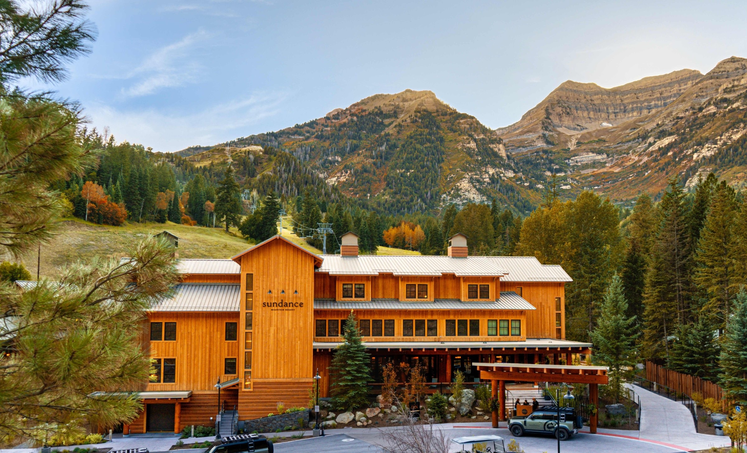 Inn exterior with mountain backdrop in autumn at Sundance Mountain Resort, Sundance, USA