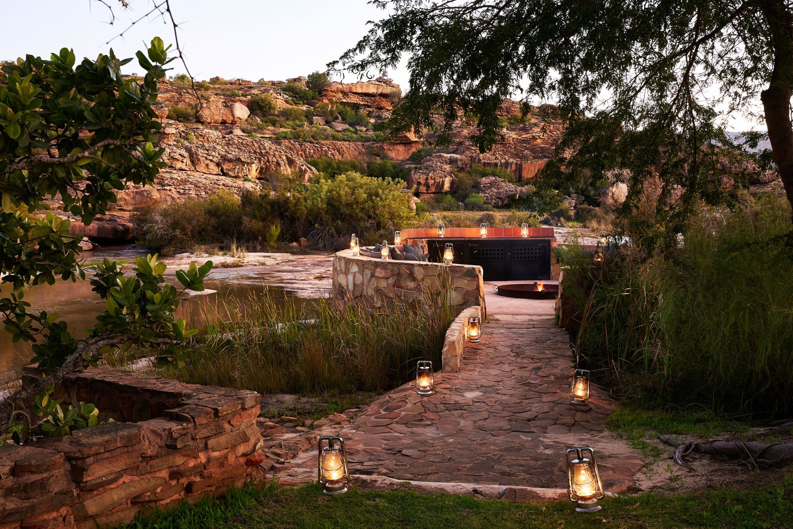 Stone pathway leading to a secluded outdoor pool, Bushmans Kloof, Cederberg Mountains, Western Cape, South Africa
