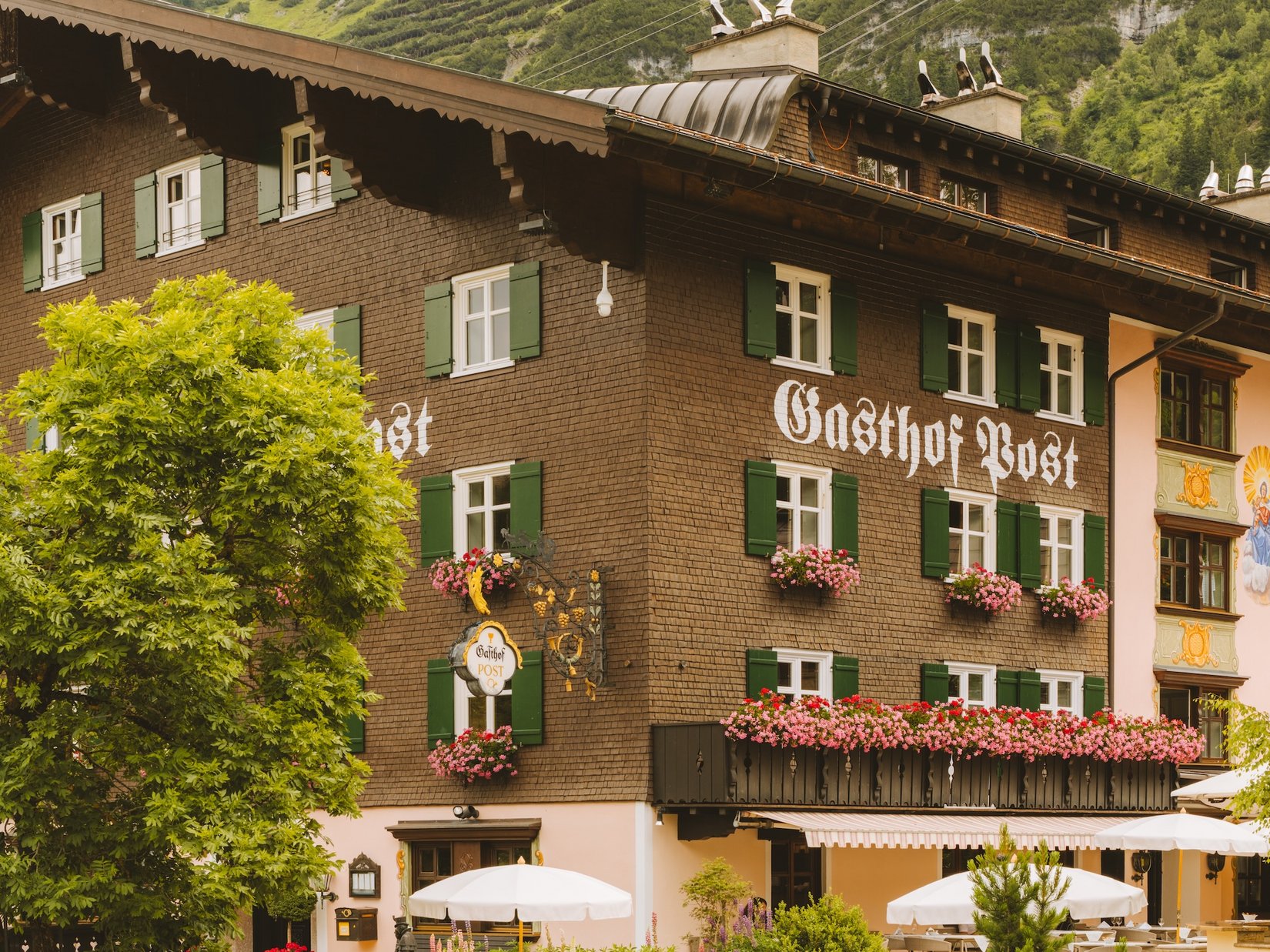 Post Lech Arlberg with the surrounding Alpine mountains.