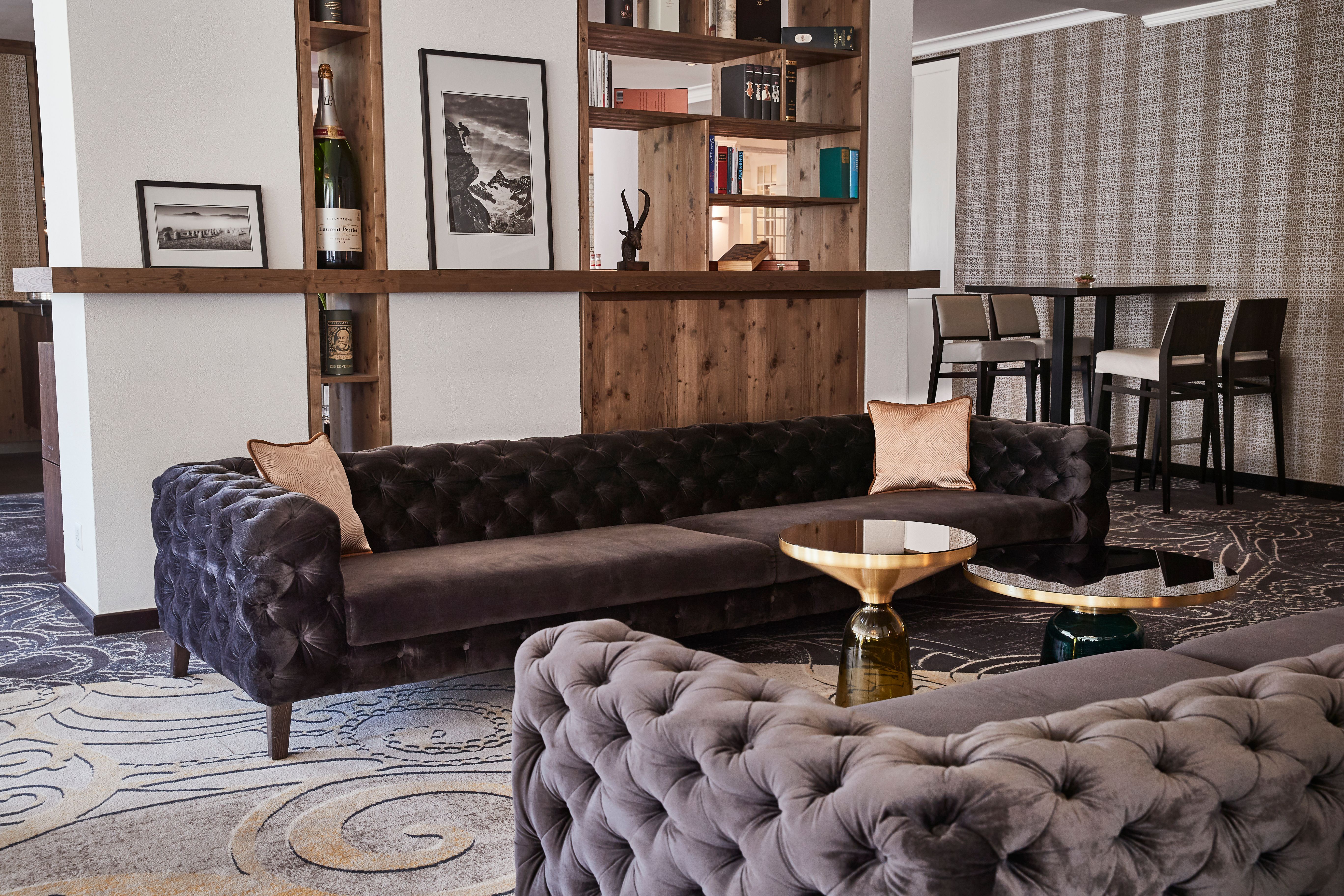 Public lounge with upholstered seating, Steigenberger Icon Grandhotel Belvédère, Davos, Switzerland