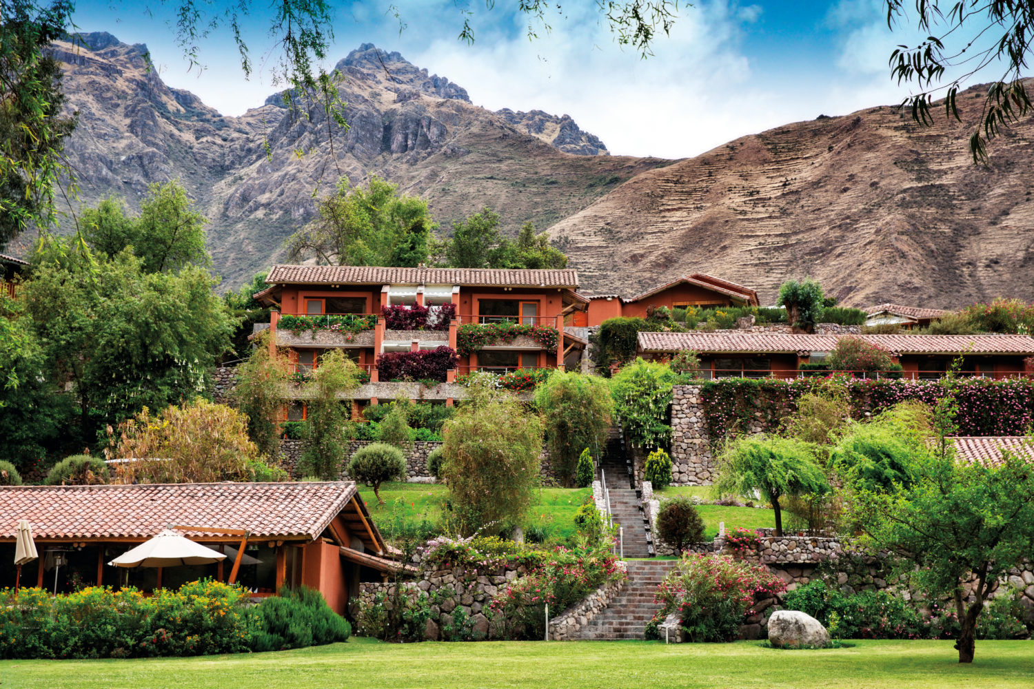 Elevated view of Belmond Hotel Rio Sagrado amid the Sacred Valley gardens