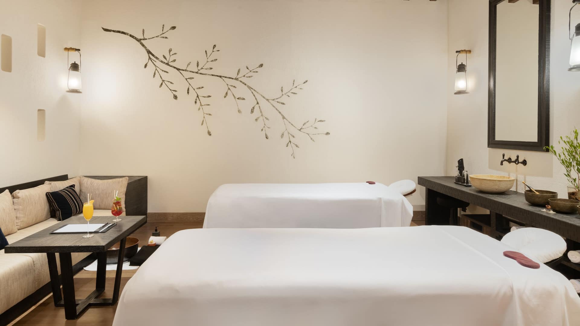 Spa treatment room with two massage tables and botanical wall decoration, Alila Jabal Akhdar, Jebel Akhdar, Oman