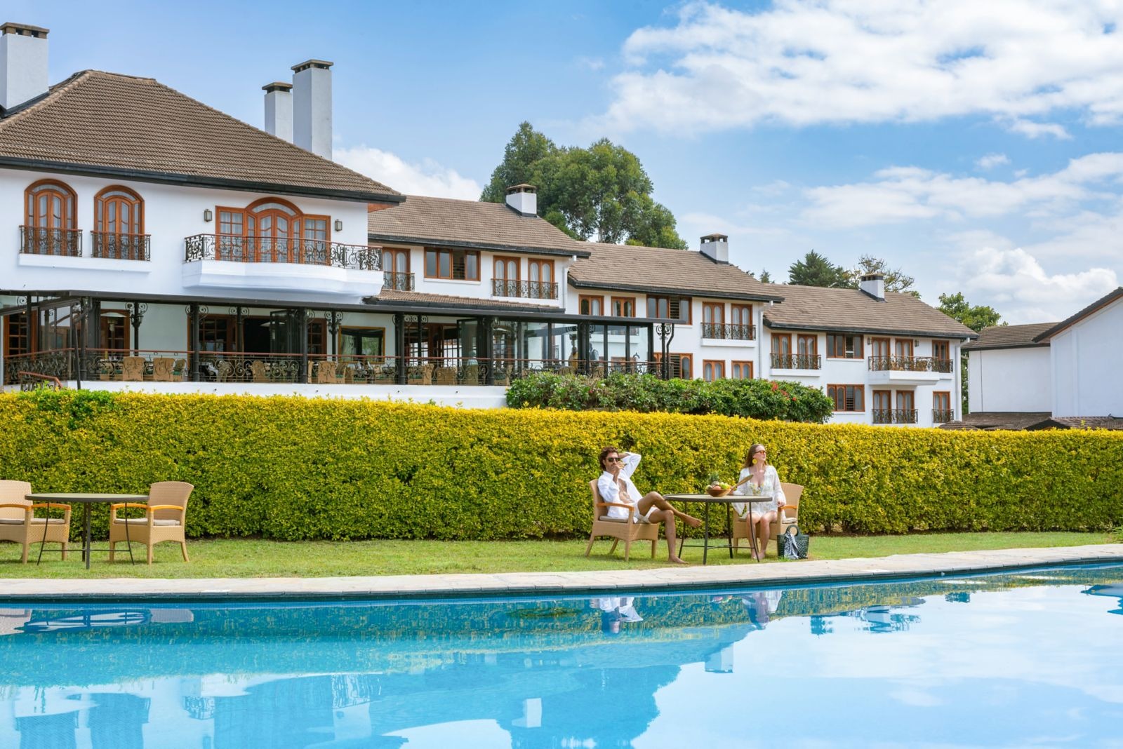Outdoor swimming pool beside the main hotel, Fairmont Mount Kenya Safari Club, Nanyuki, Kenya