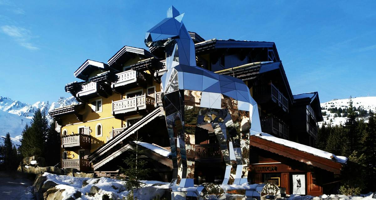 Snow-covered Alpine peaks in winter light